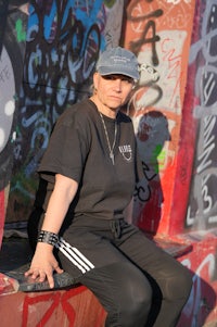 a man wearing a black hat